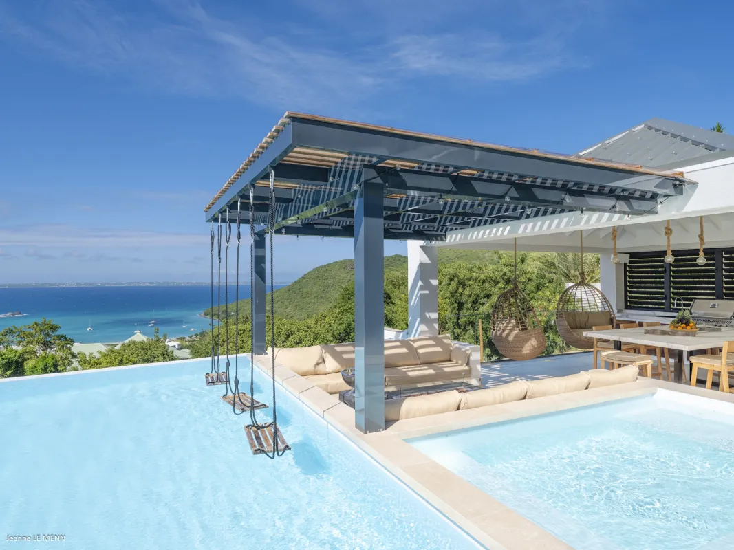 Villa Abaca: Infinity pool with overwater swings and a sunken lounge overlooking the sea