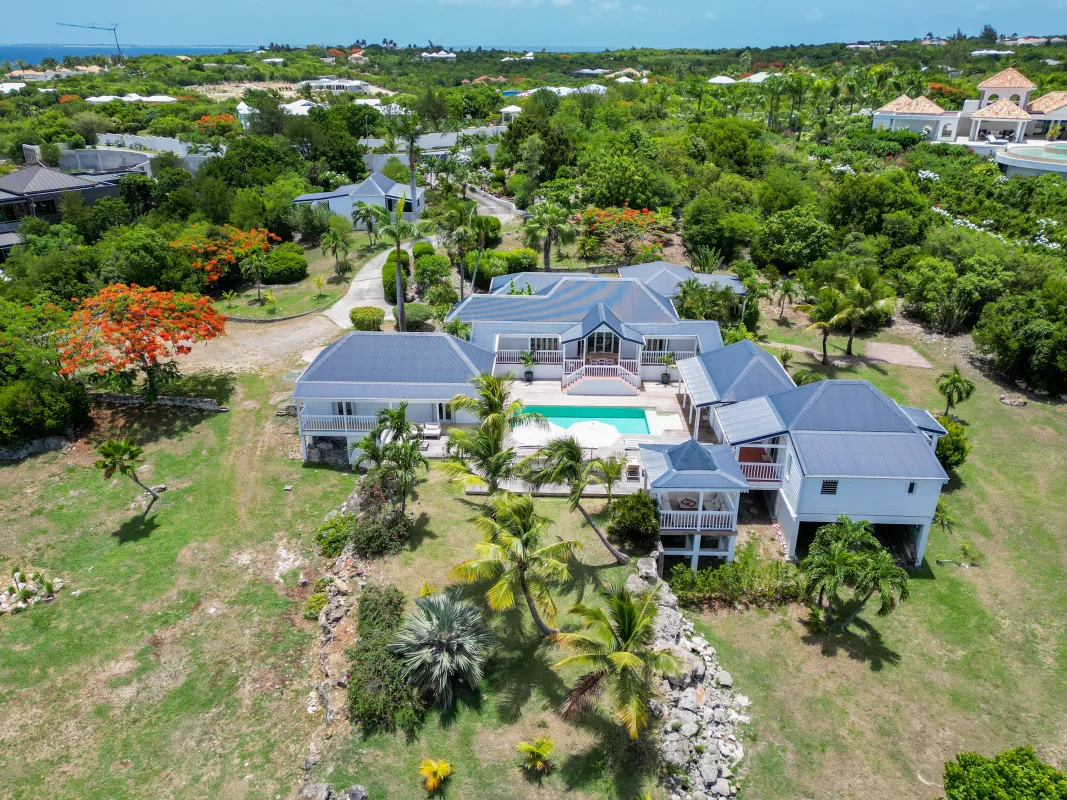 Villa Coco Paillette: Aerial view of a villa estate featuring a swimming pool, sun terrace, and tropical gardens
