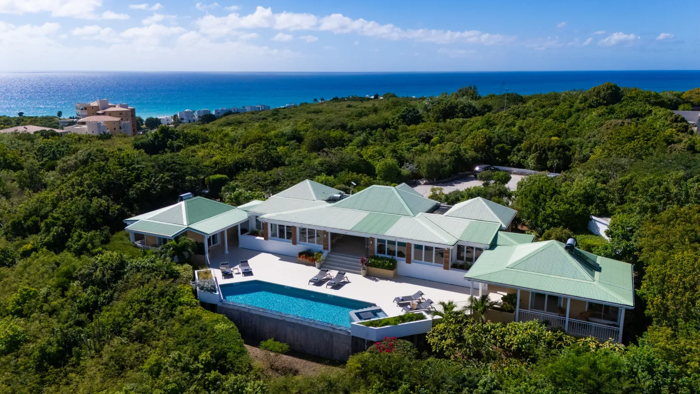 Villa Osun: Aerial view of a villa with a swimming pool surrounded by lush tropical greenery